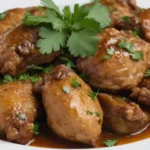 un plato de gizzardes de pollo suculentos y dorados o mollejas
